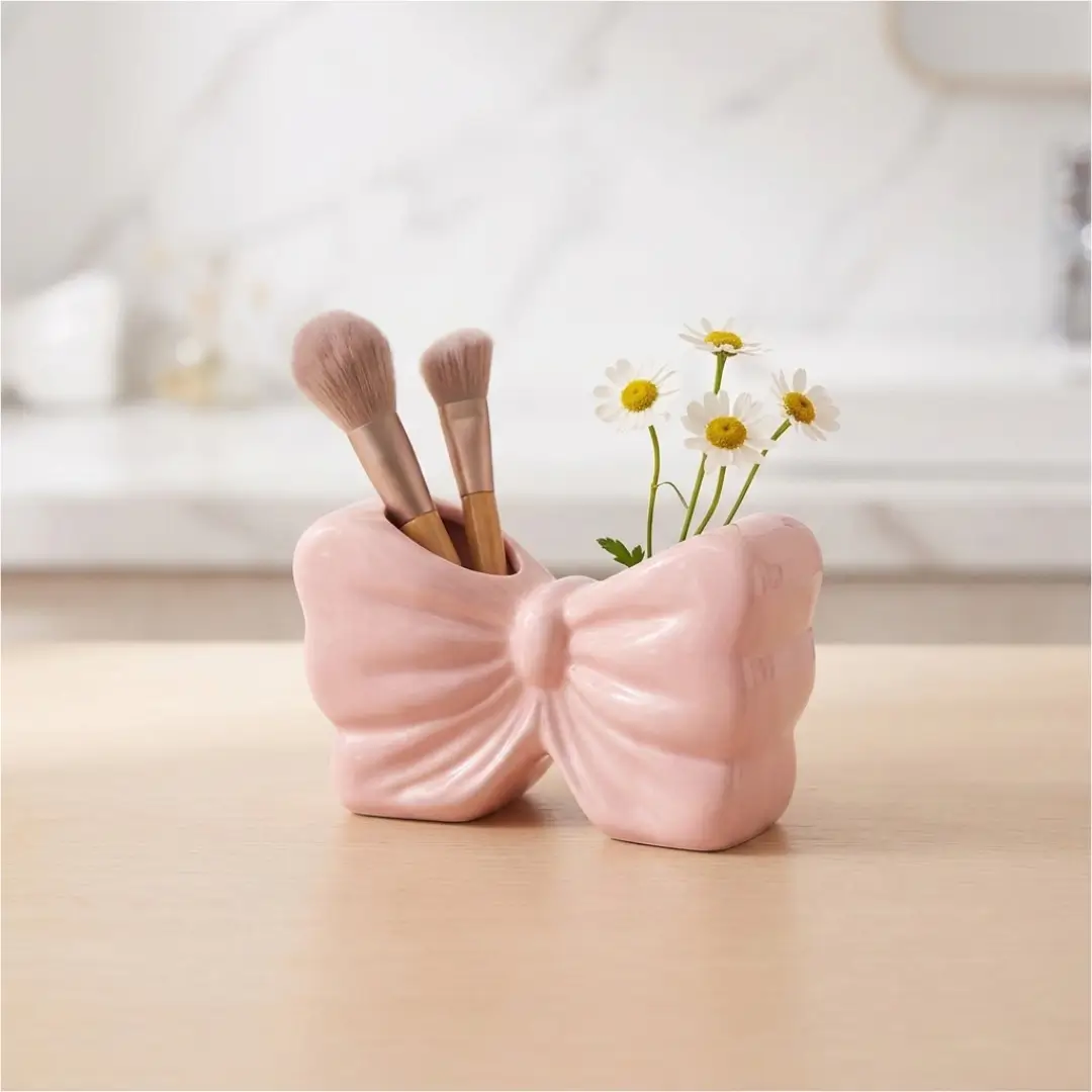 Bow brush holder